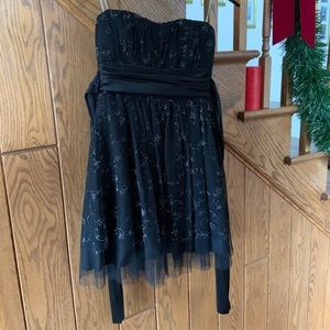 Strapless black dress with silver flower design